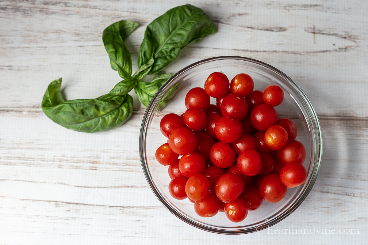 Bowl of whole cherry tomatoes.