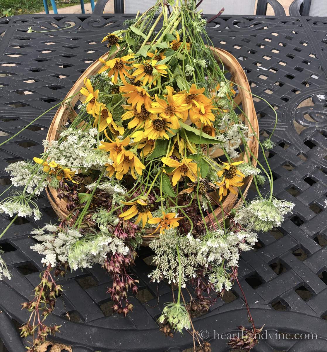 Bunches of flowers on a tobacco basket.
