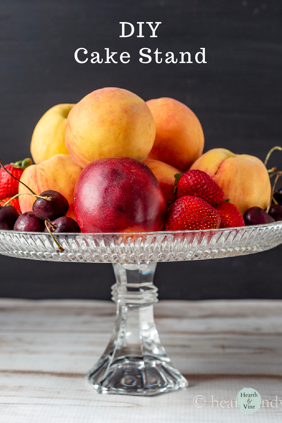 Upcycled cake stand with fruit on top.