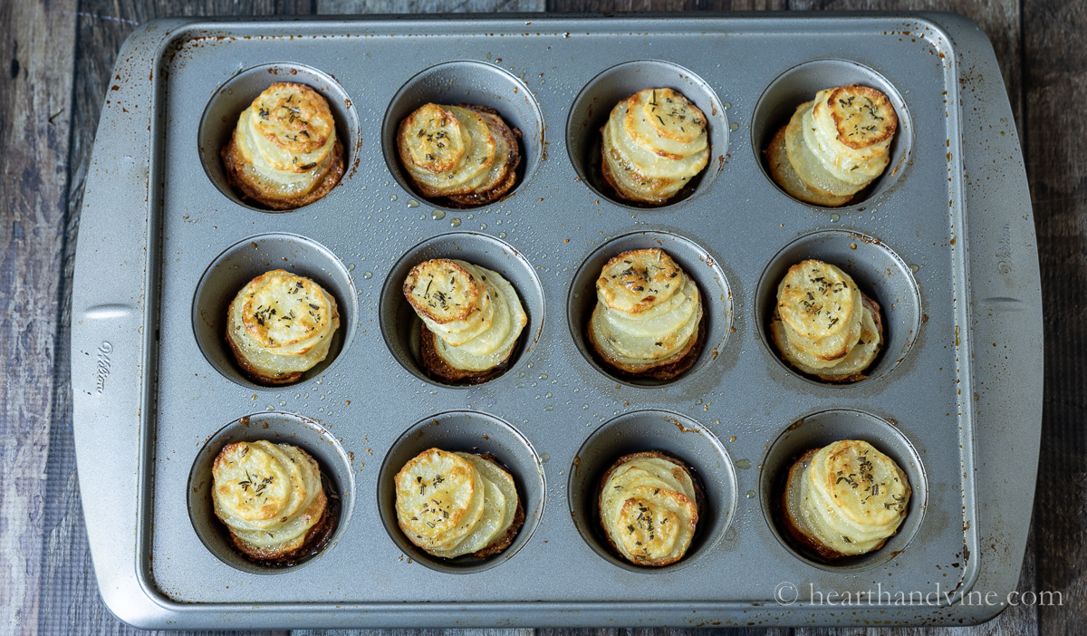 Baked potatoes in muffin tins.