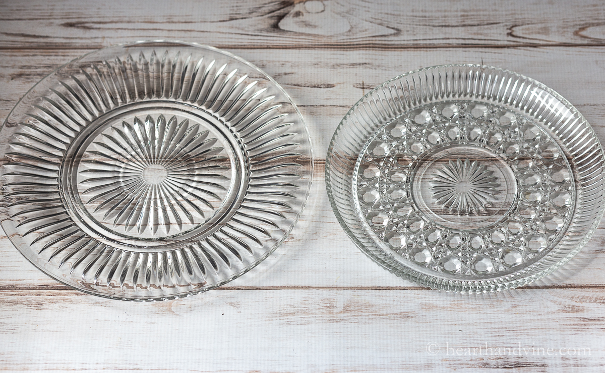 Two glass platters with different designs.