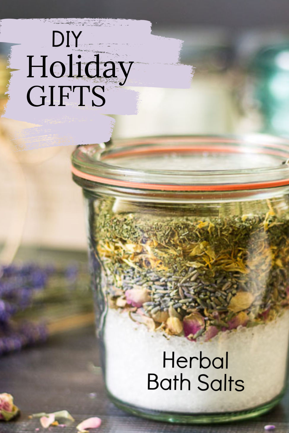 Weck jar with layers of herbs and bath salts scented with essential oil.