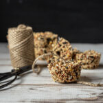 Birdseed cakes with twine and scissors