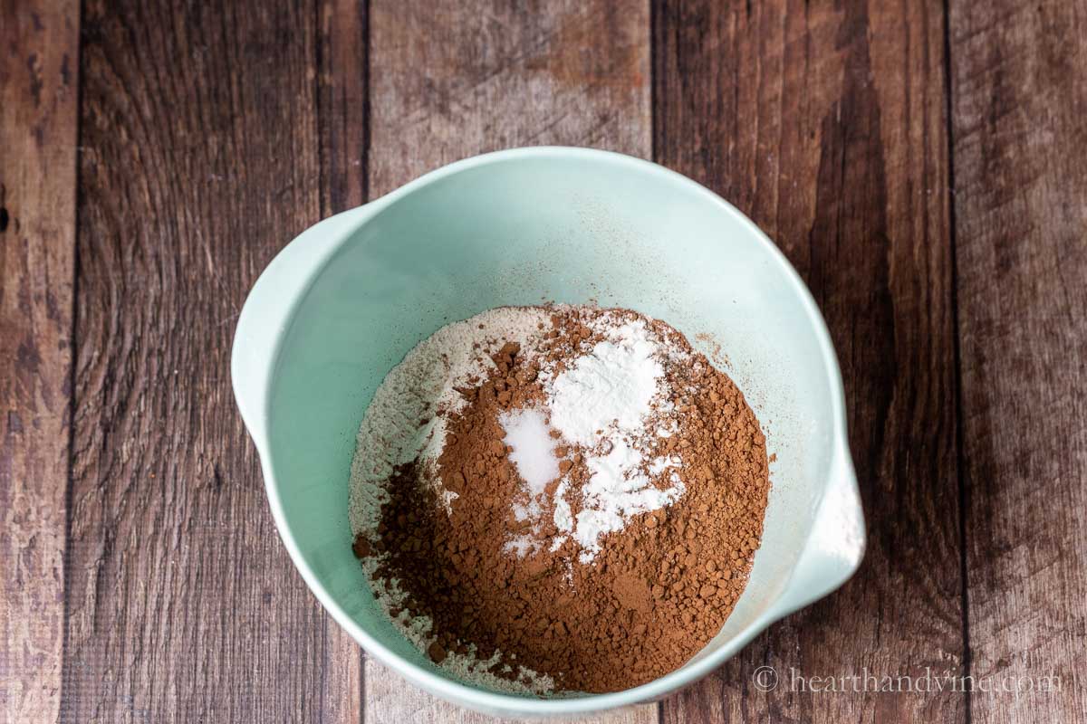 Dry brownie ingredients including flour, salt, baking powder and cocoa.