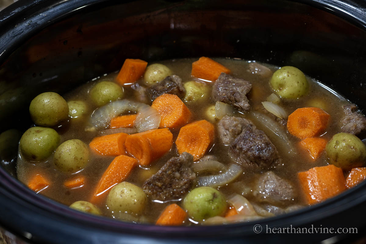 Beef and vegetables getting started in the slow cooker.