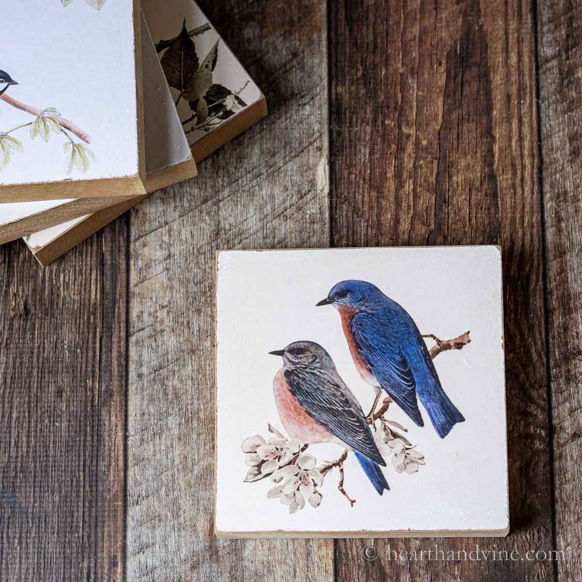 https://hearthandvine.com/wp-content/uploads/2023/02/wood-block-art-blue-birds-sq.jpg