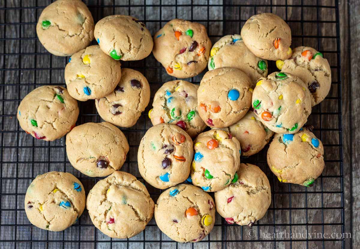 Peanut butter M&M cookies on a wire rack.