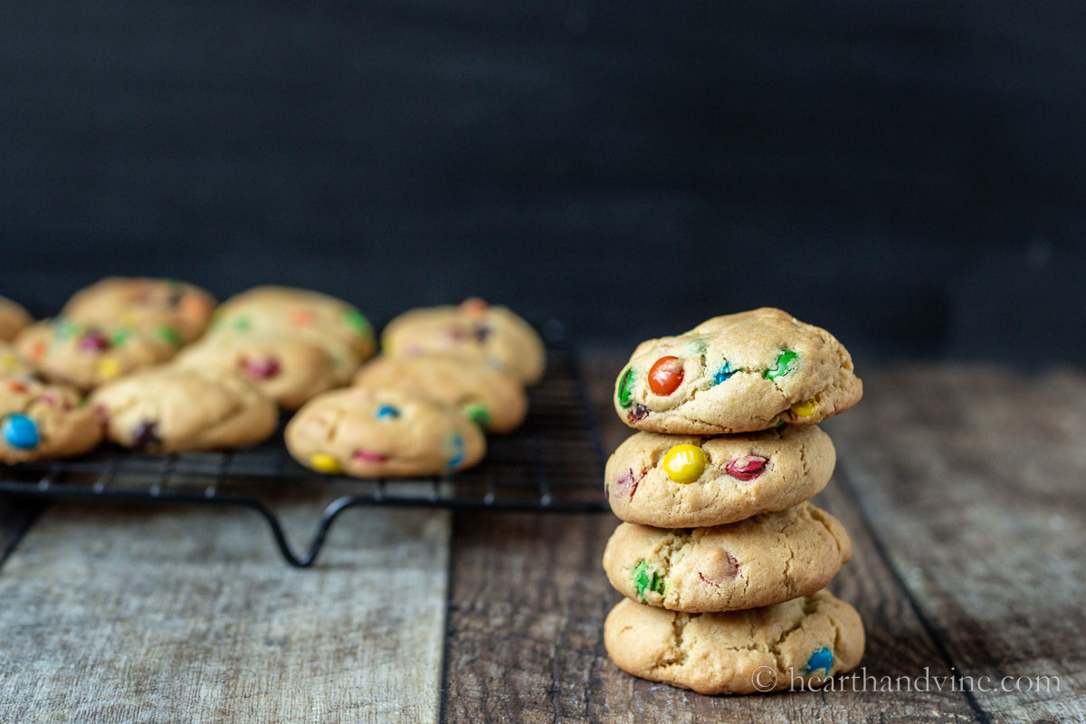 A stack of peanut butter cookies with mini m&ms.