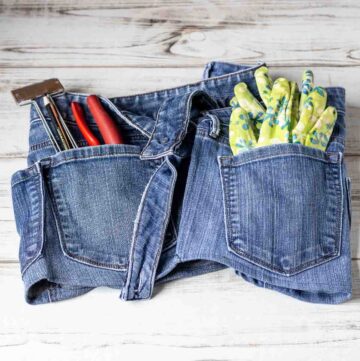 Upcycle jeans into a gardening apron with several pockets to hold tools and gloves.