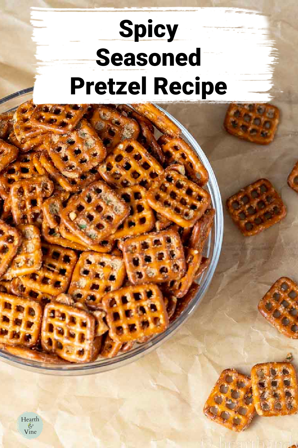 Bowl of seasoned spicy square pretzel shapes.