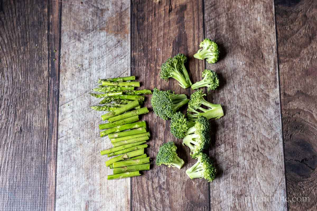 Asparagus and broccoli florets cut into bite sized pieces.