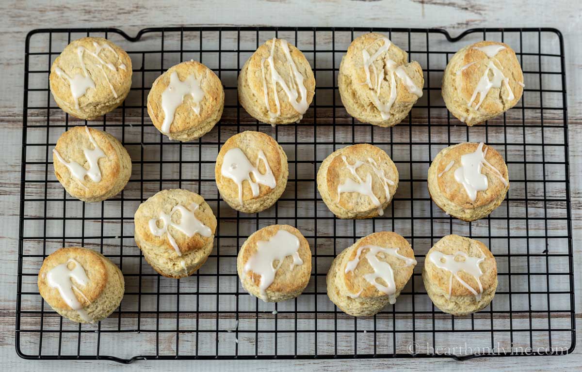 Glazed scones on a wire cooling rack.
