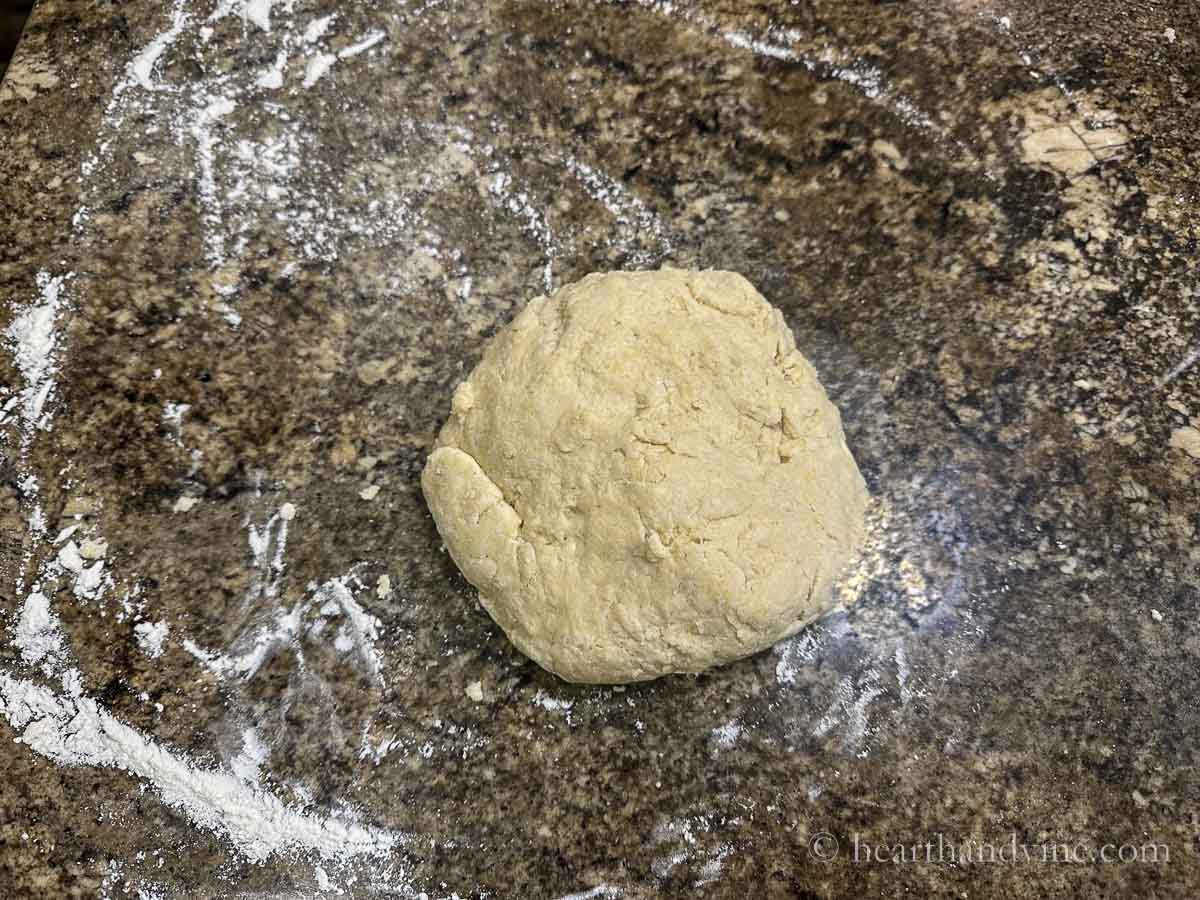 Scone dough on a floured surface.