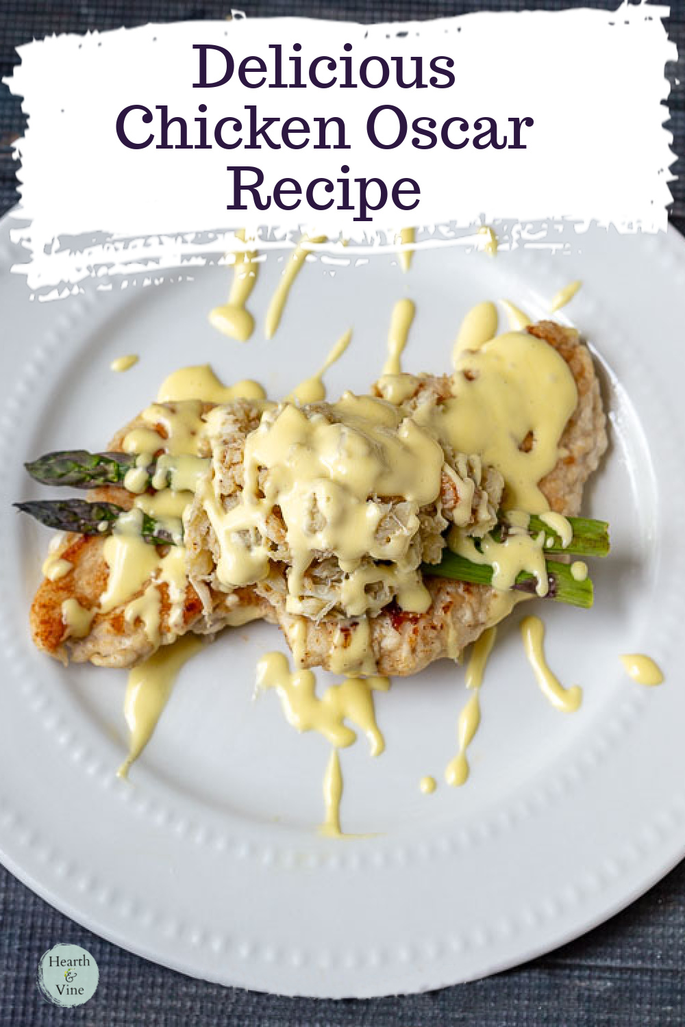 Chicken oscar. Breaded chicken breasts topped with asparagus, crab meat and hollandaise sauce.