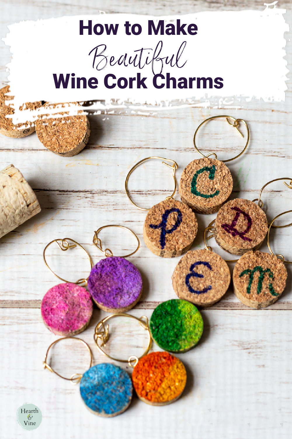 Wine charms made out of slices of wine corks and gold wire. Some have letters on them and some are colored with ink.