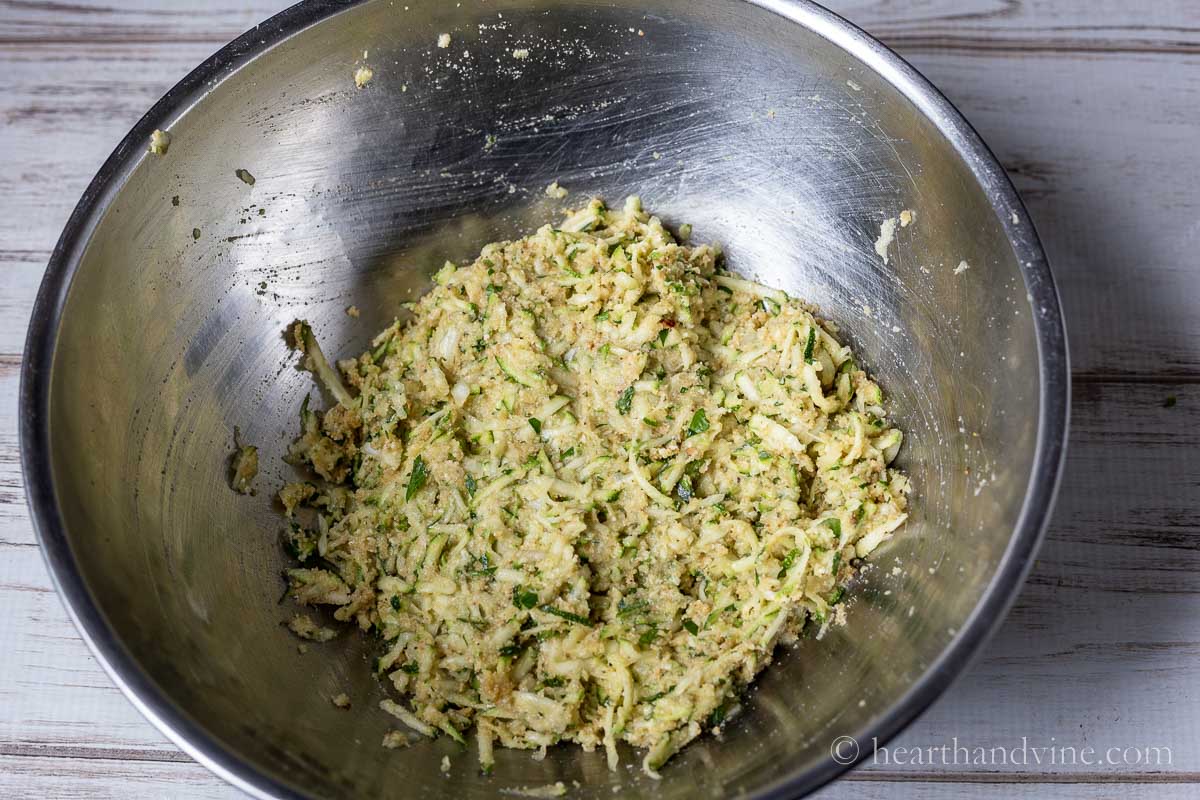 Zucchini bite mixture in a large mixing bowl.
