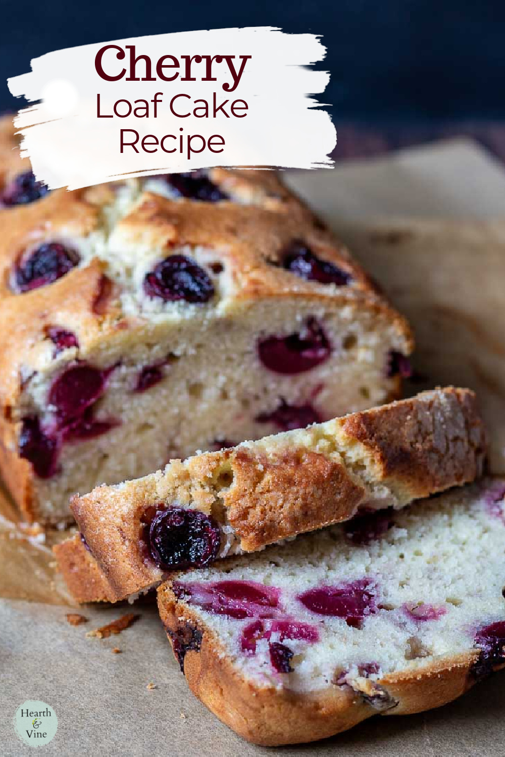 Cherry loaf cake with a few slices.