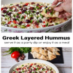 Greek layered hummus with a hand dipping a pita wedge over the same dip.