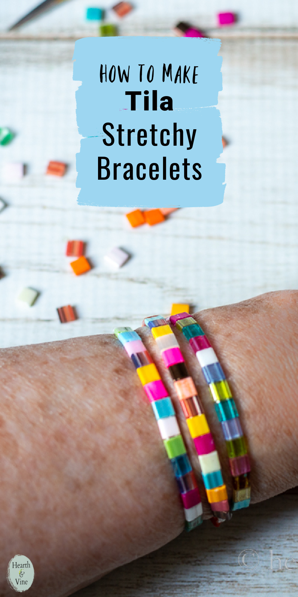 Three tila bead stretchy bracelets on a wrist next to several additional beads and a box tila beads.