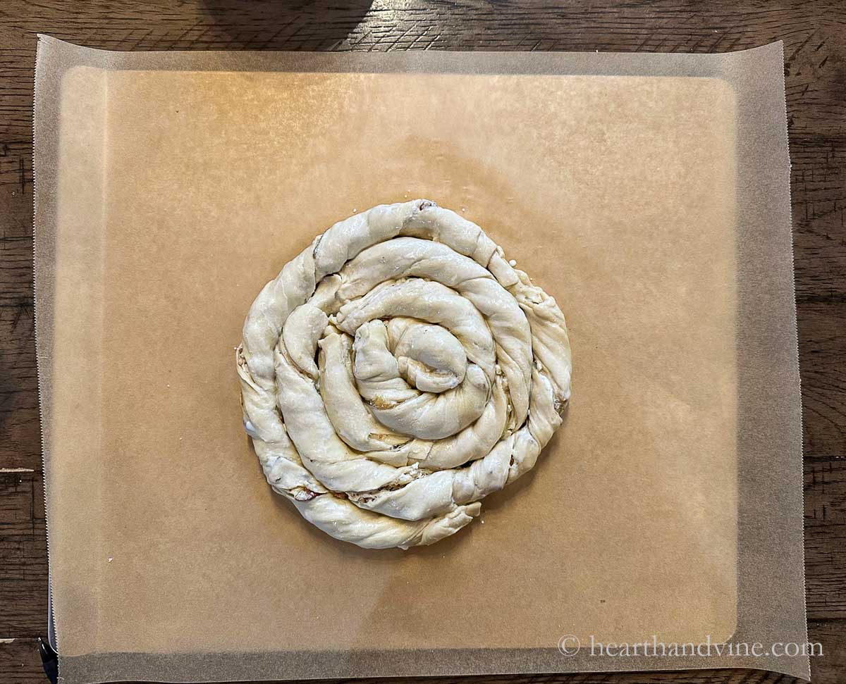 Half and half brushed onto the puff pastry spiral.