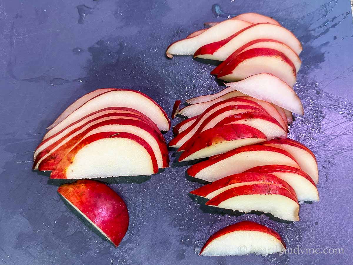 Thin slices of a red pear.