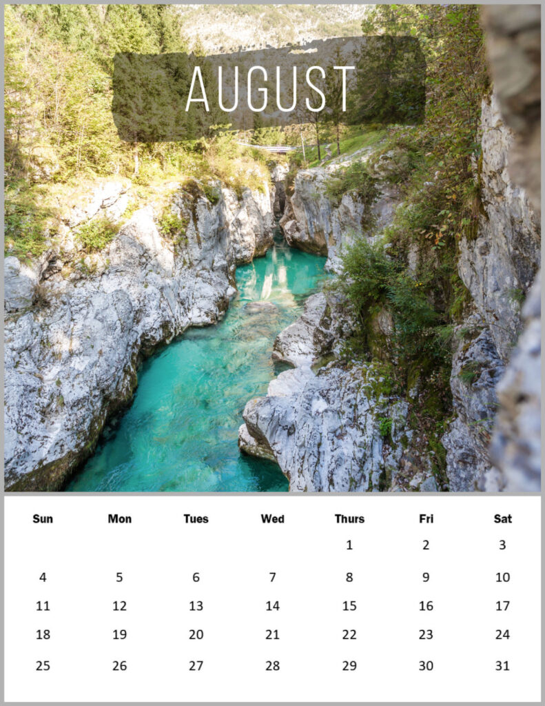 A stream or river in a ravine with the month of August 2024 calendar below.