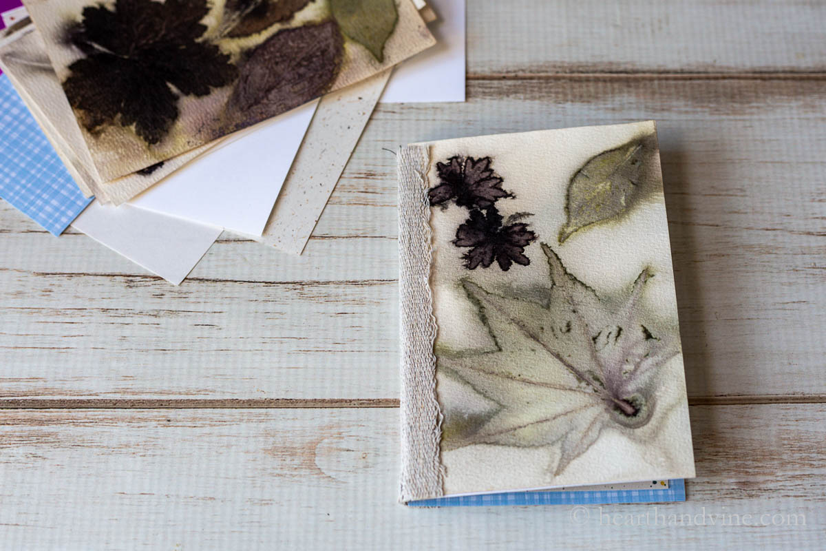 Botanical printed mini booklet with fabric binding.