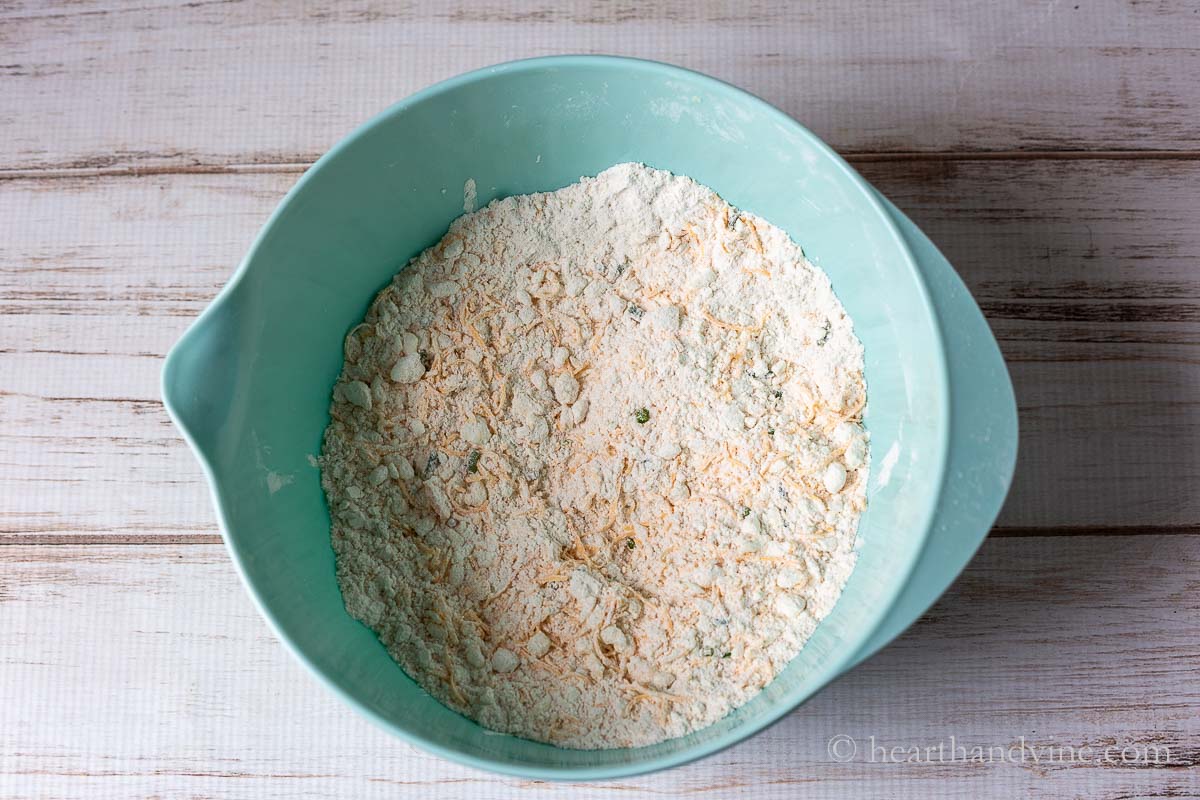 Flour mixture with butter, cheese and chives mixed in.