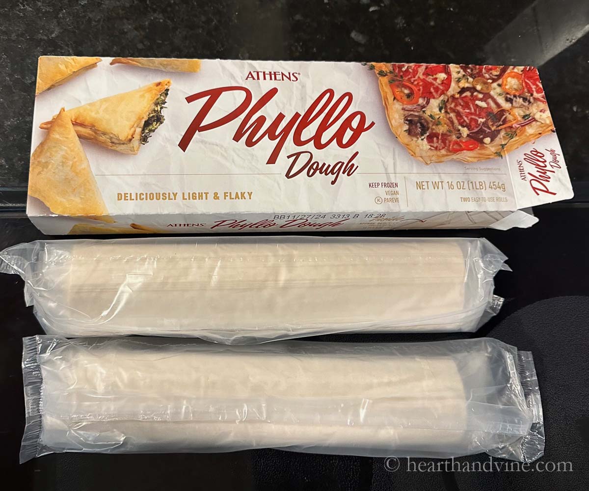 Two packs of phyllo dough.