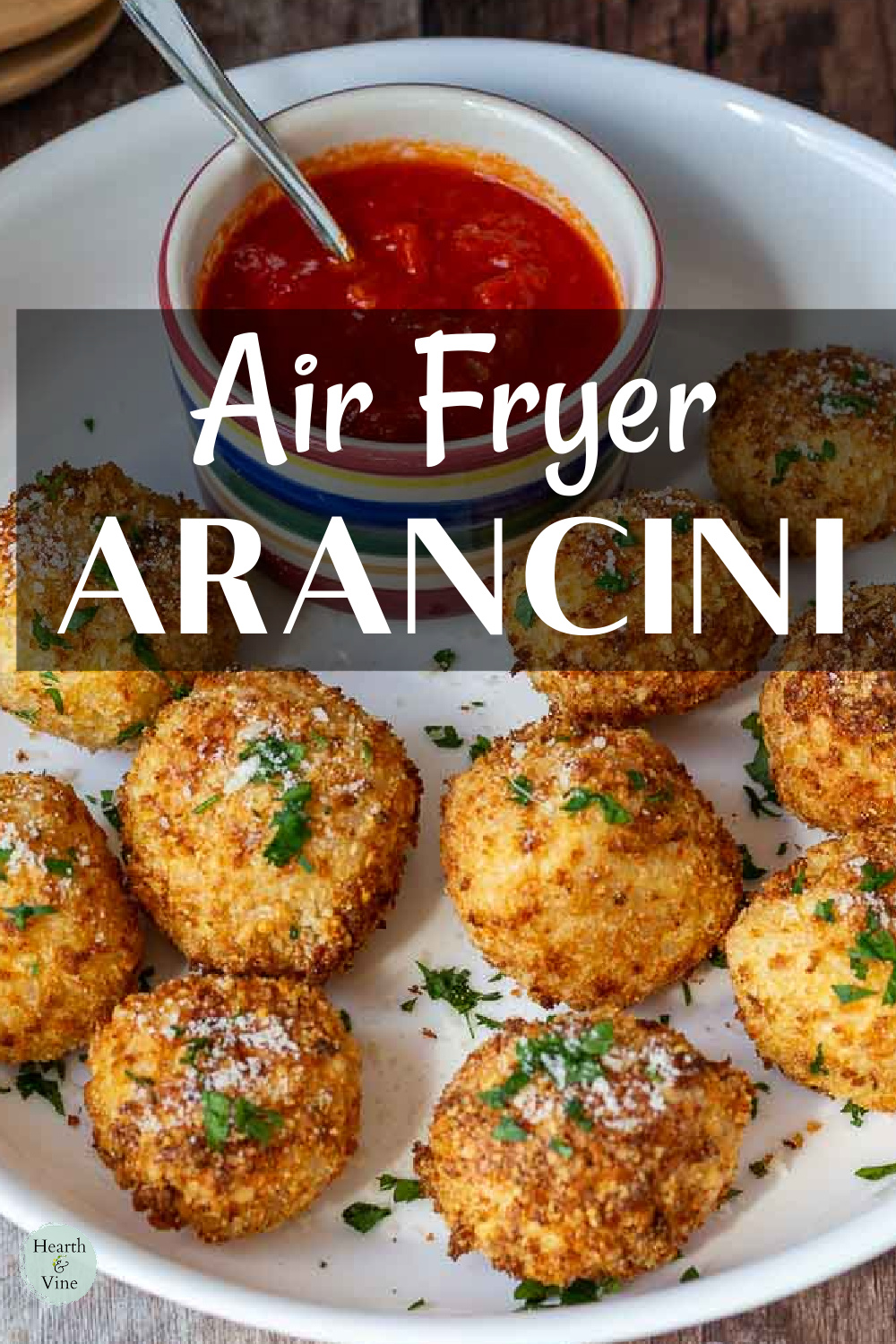 Air fryer arancini balls with mozzarella and marinara.