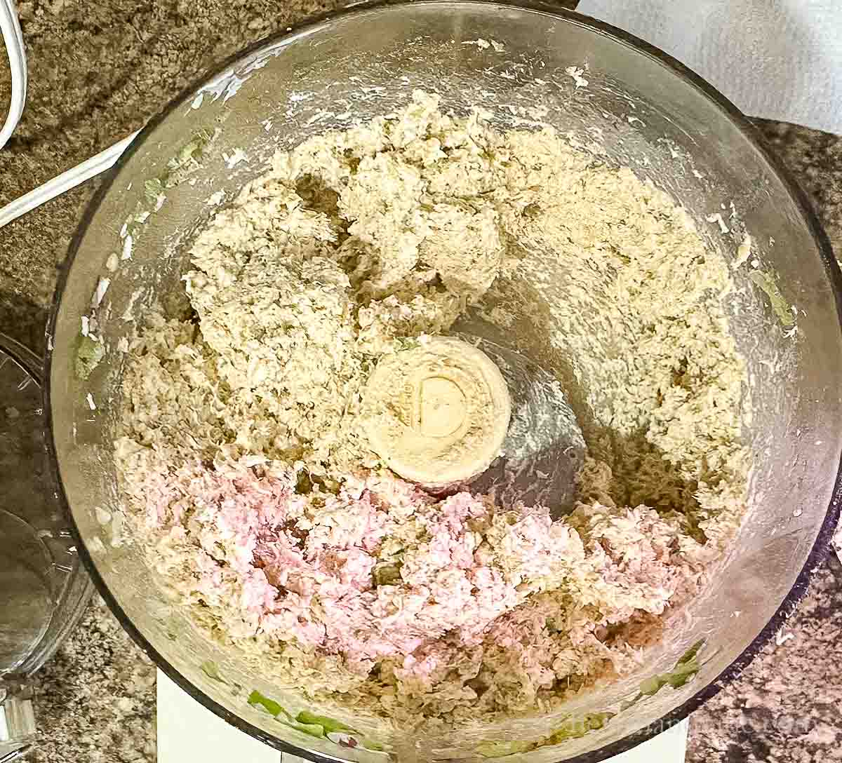 Chicken, onions, peppers, cheese and spices in a food processor.