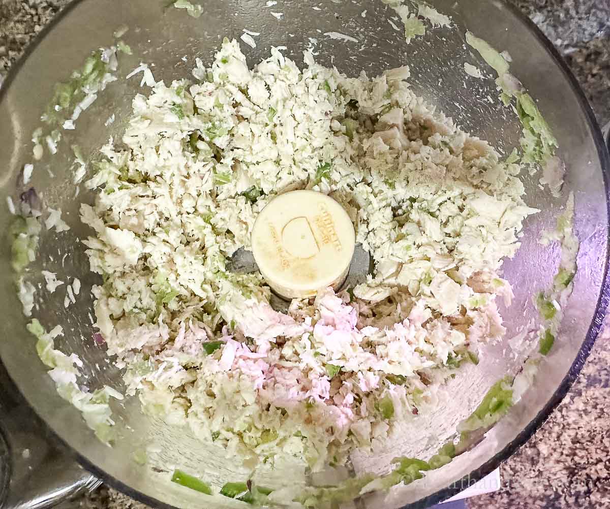 Chicken, onion and peppers blended in a food processor.