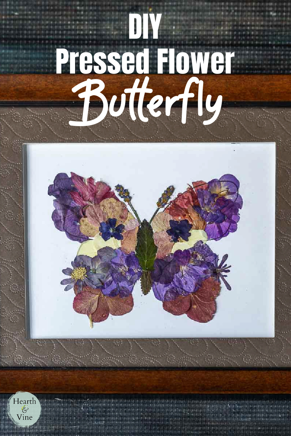 Framed pressed flower butterfly.