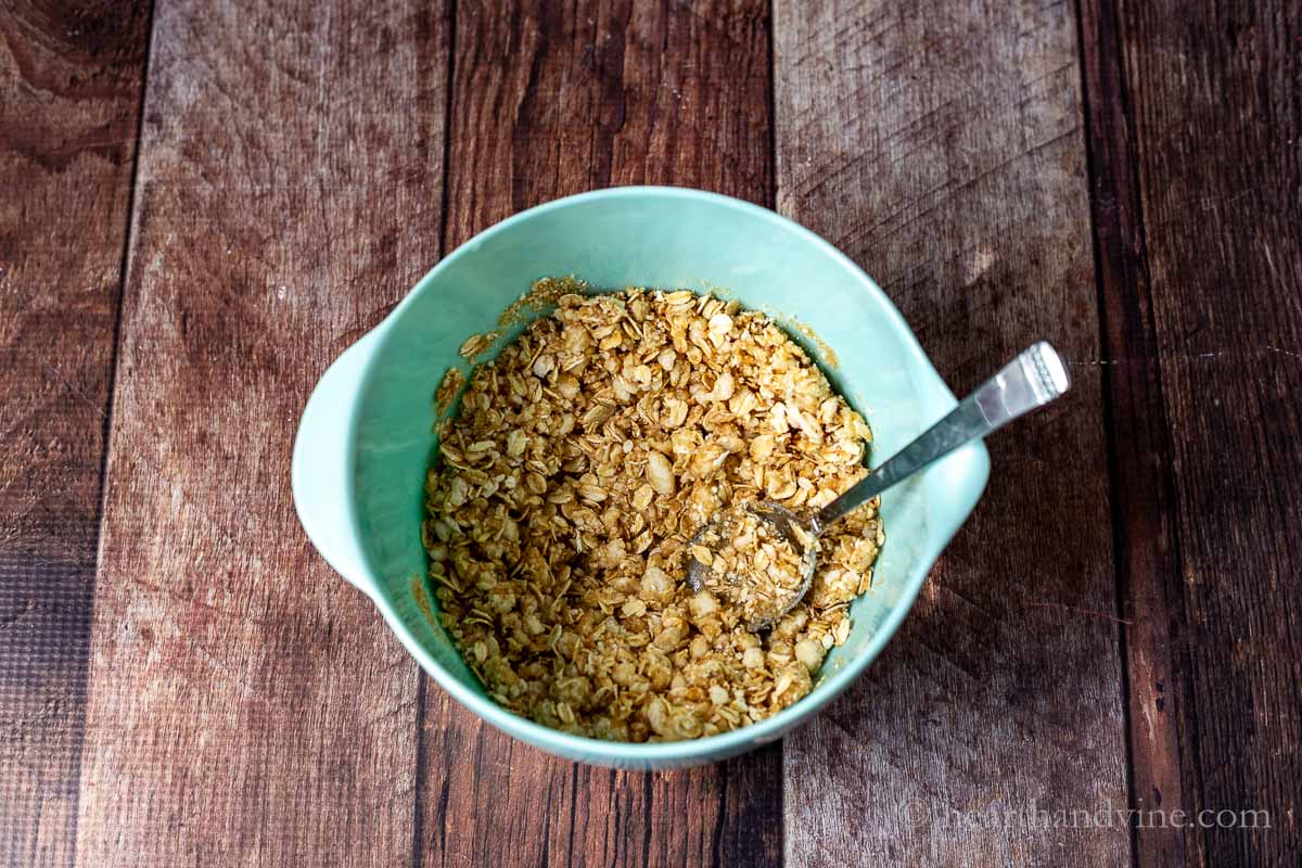 Small blue bowl with crumble topping.