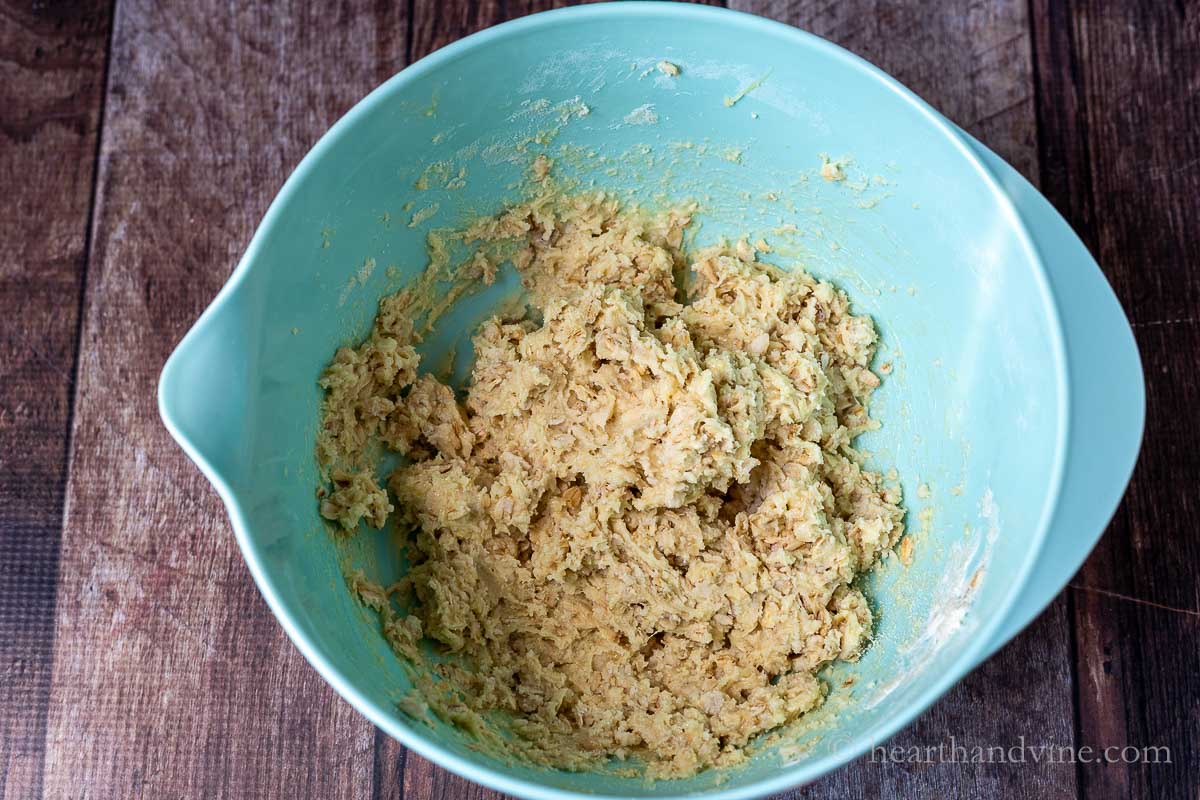 Crust mixture with egg in a bowl.
