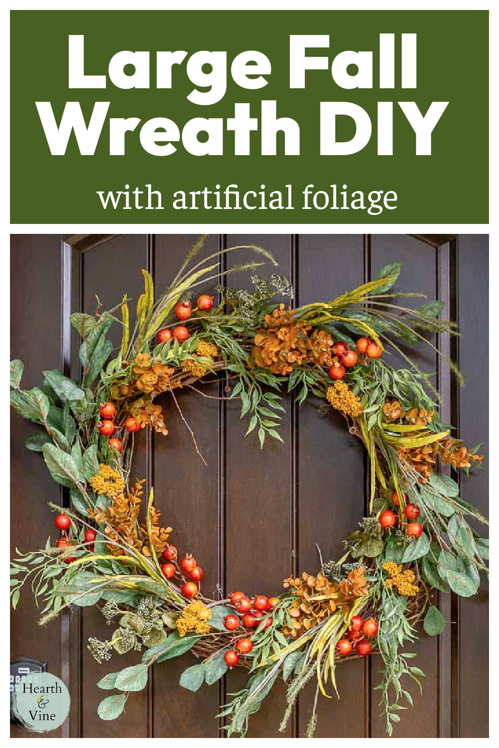 Fall grapevine wreath with artificial foliage on a front door.