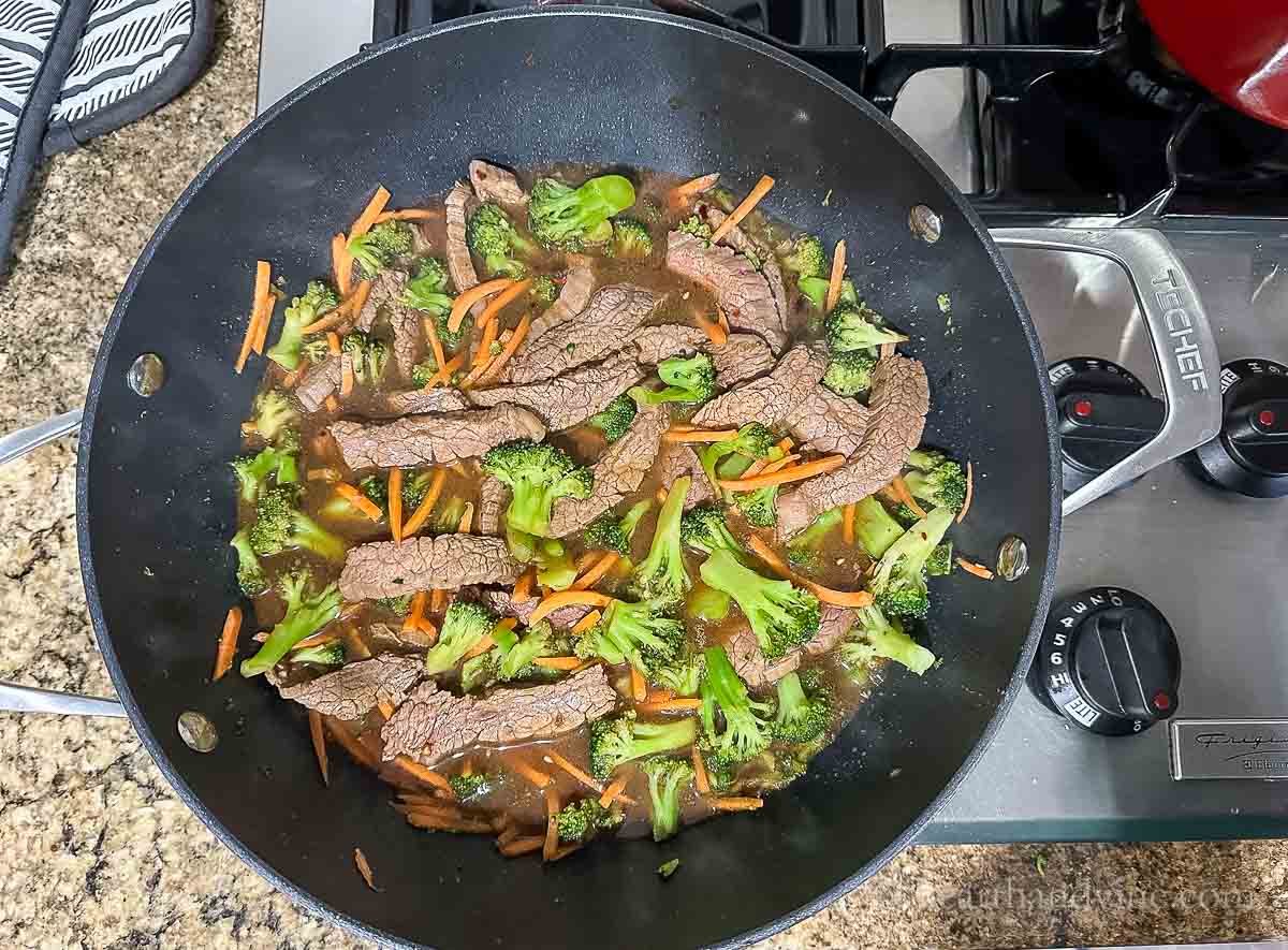 All beef and broccoli ingredients in the skillet.