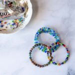 Three memory wire bracelets.