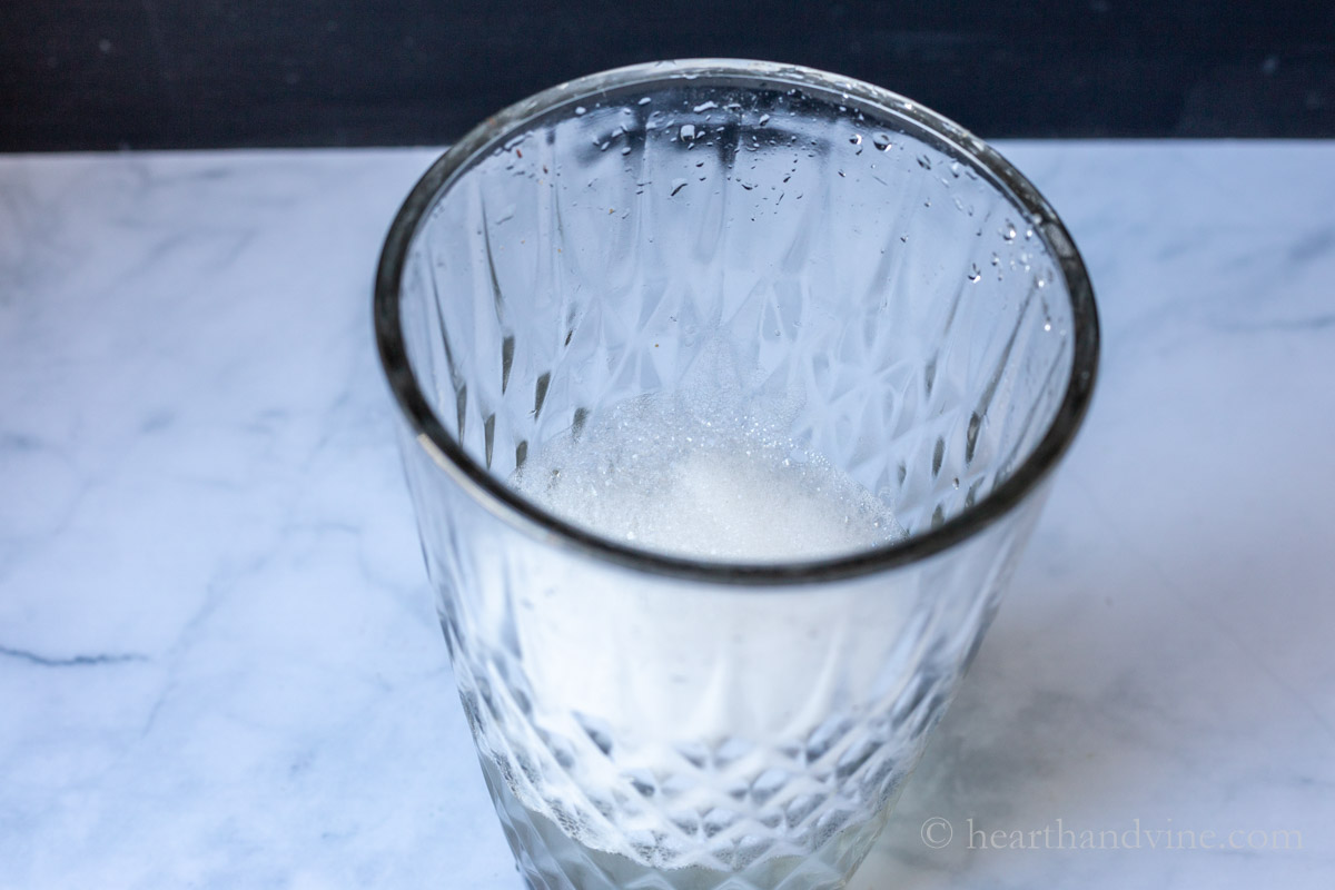 Large vase with soap water.