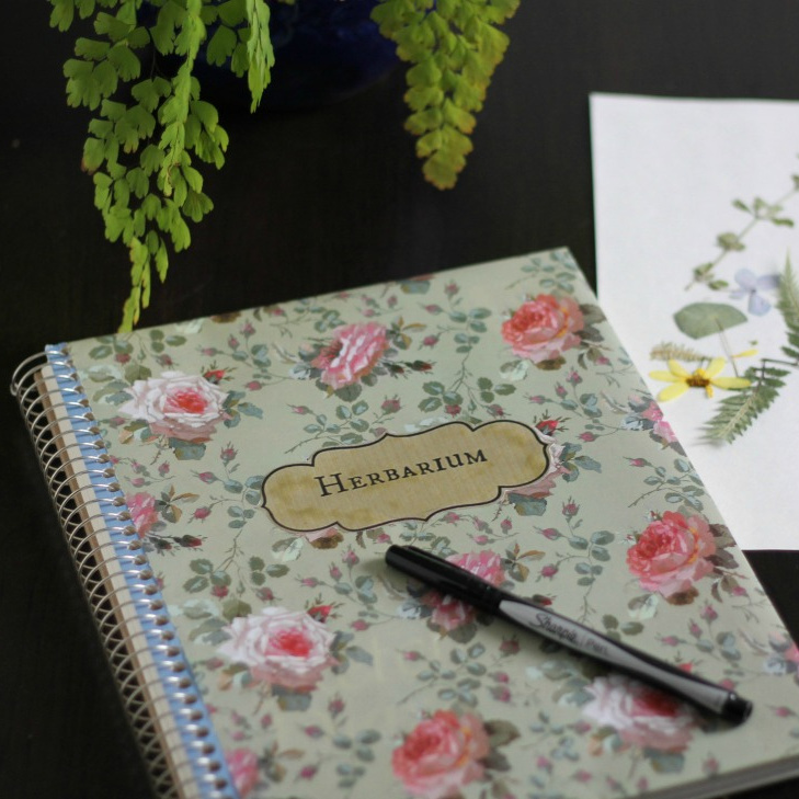 Floral covered herbarium journal.