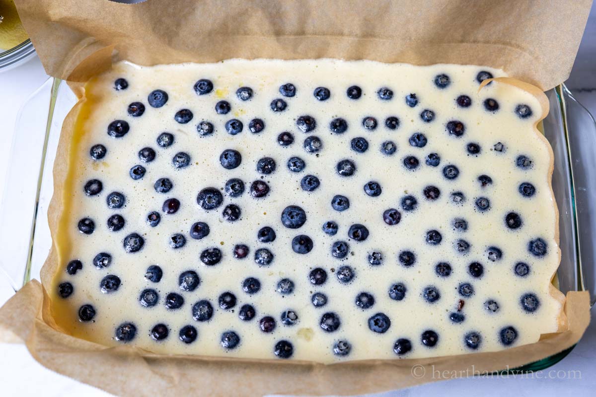 Blueberry lemon filling poured onto the crust.