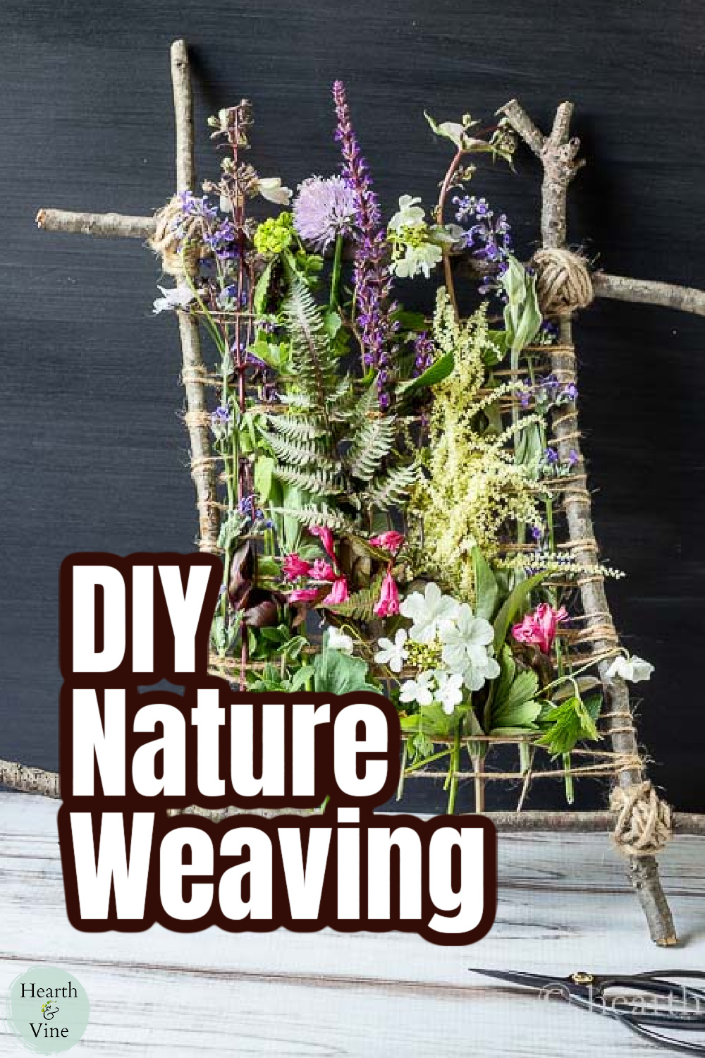 Small branch nature weaving with flowers, and herbs.