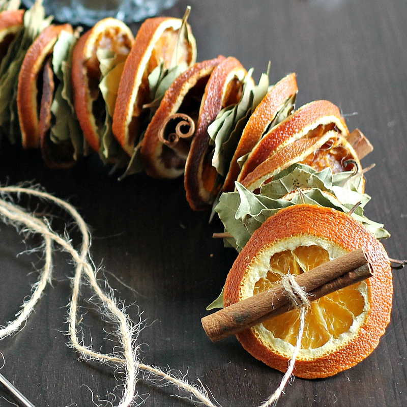 Fall garland made from dried orange slices, bay leaves and cinnamon sticks.