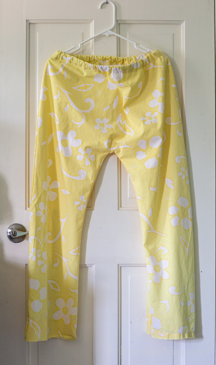 PJ pants hanging on a white door.