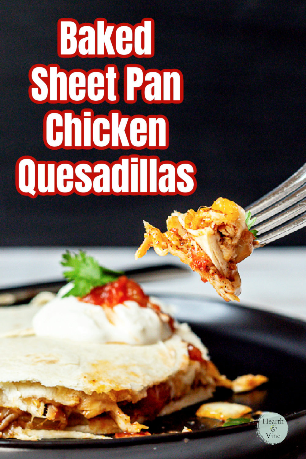 Fork lifting a bite of a chicken quesadilla from a plate.