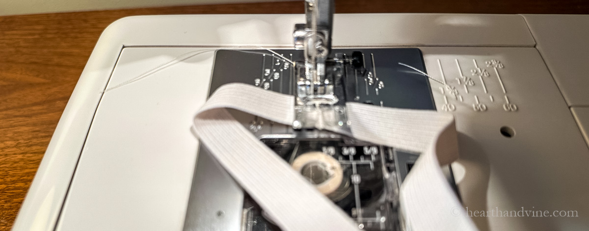 Sewing the ends of the elastic.