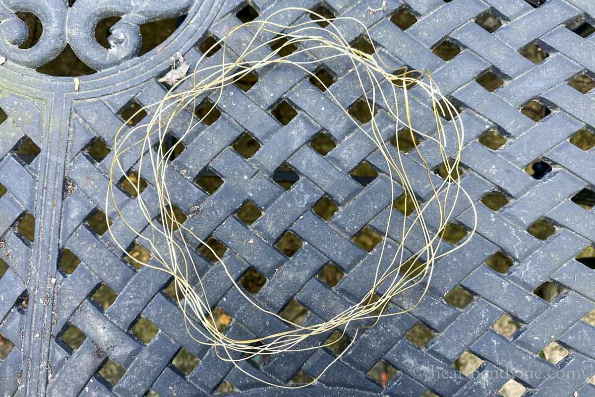 Gold wires shaped in a haphazard form.
