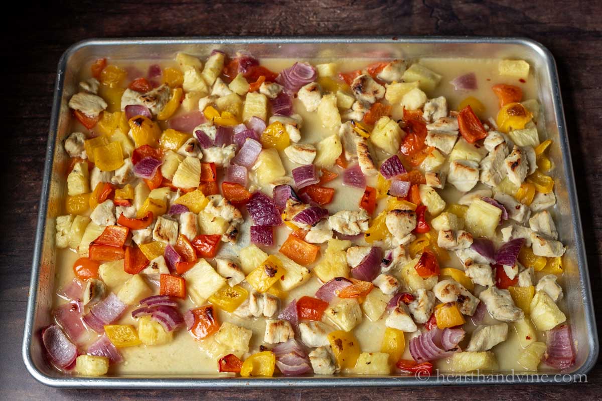 Hawaiian chicken sheet pan dinner after baking in the oven.