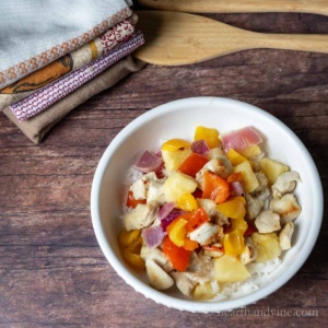 Bowl of Hawaiian chicken over rice.