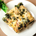 Aerial view of a slice of vegetarian lasagna.